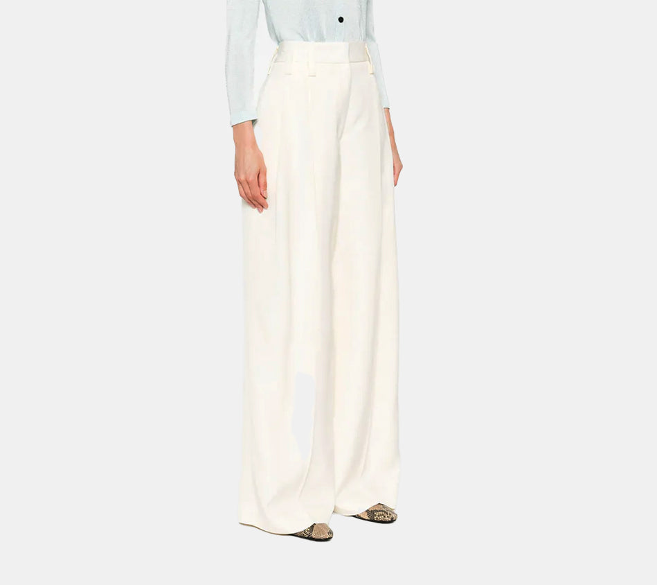 JIL-SLIGHTLY HIGH WAISTED VOLUMINOUS PLEATED PANT WITH METAL ZIP CLOSURE. BELT LOOPS, SIDE SEAM AND BACK WELT POCKETS. LOW CROTCH